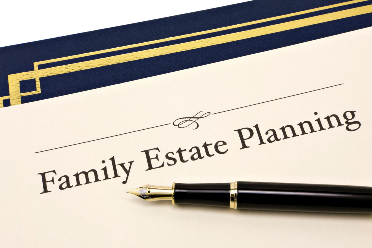 Image of a Family Estate Planning document and a pen